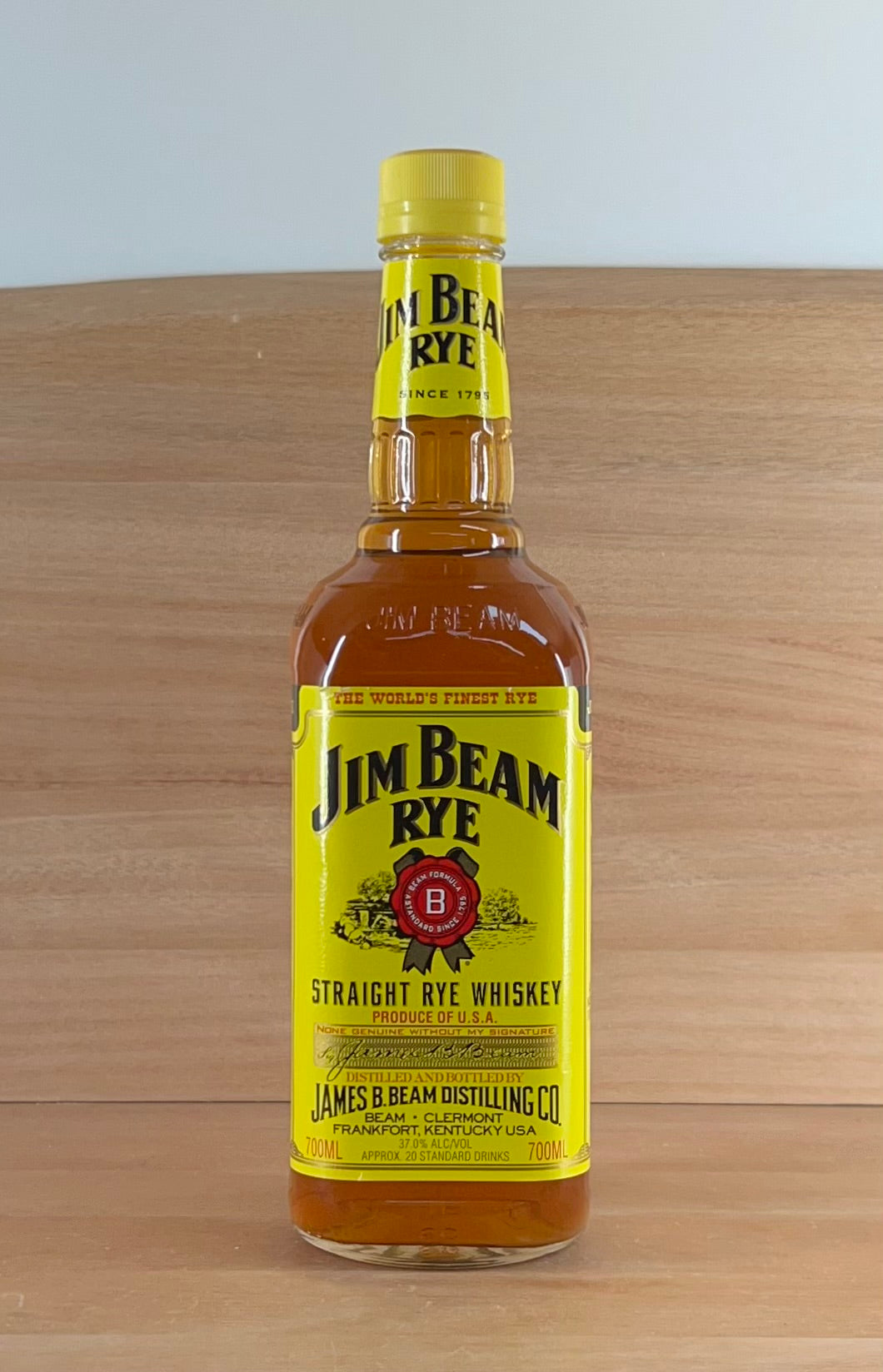 Jim Beam Rye (older style bottle, bright yellow label, 6 generation, yellow plastic cap)